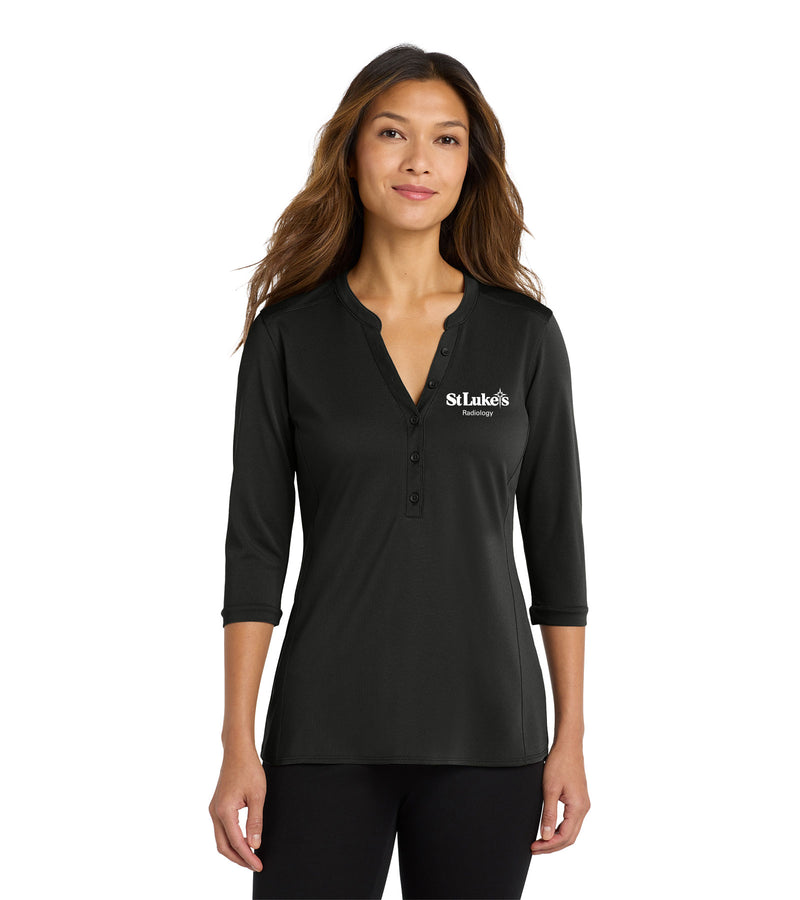 Woman wearing a black long-sleeve shirt with a logo on a white background